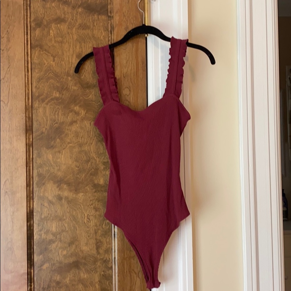 Bodysuit with ruffled straps
